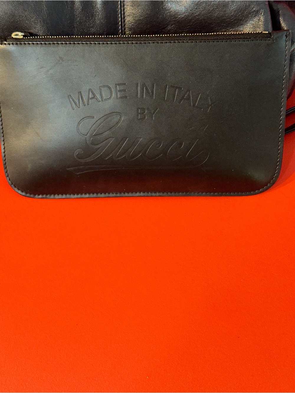 Gucci Black Leather Wristlet Clutch with Embossed 'Made in Italy' Logo